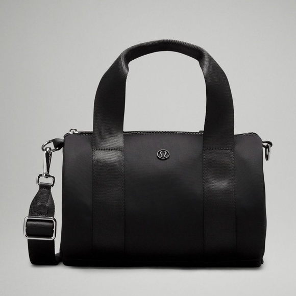 lululemon athletica Handbags - Lululemon NWT Knit Nylon Mini Barrel Duffle Crossbody Bag 5L Black